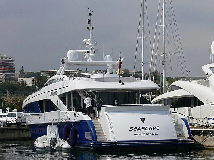 a boat docked at a pier aboard HASHTAG Yacht for Sale