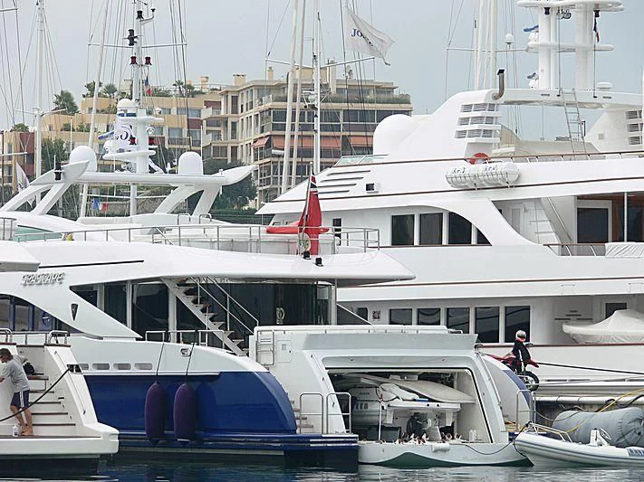 a group of boats are parked in a harbor aboard HASHTAG Yacht for Sale