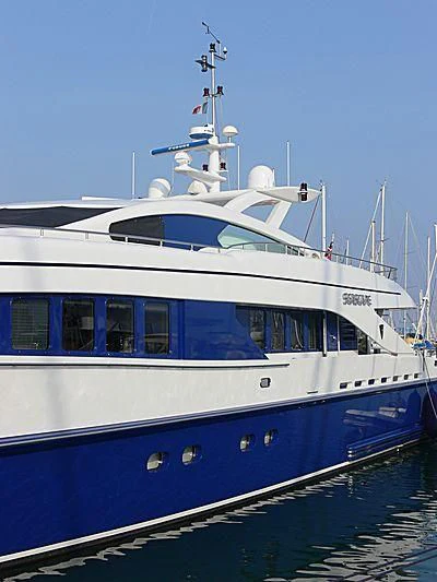 a white and blue boat aboard HASHTAG Yacht for Sale