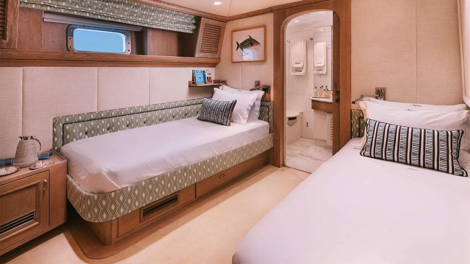 a room with two beds aboard NATALIA V Yacht for Sale