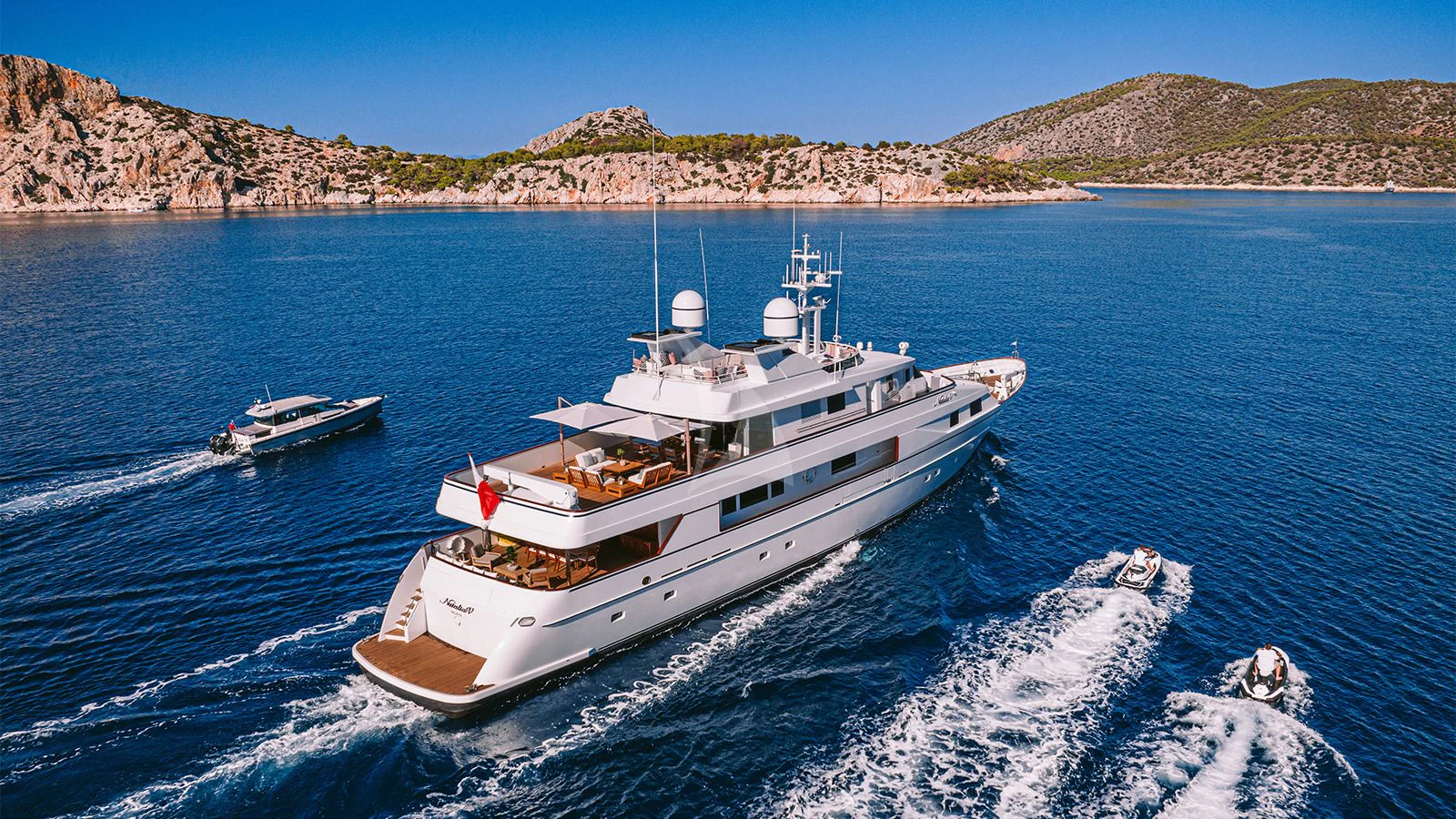 a boat on the water aboard NATALIA V Yacht for Sale
