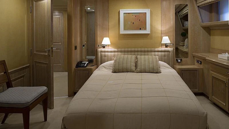 a bed in a hotel room aboard NATALIA V Yacht for Sale