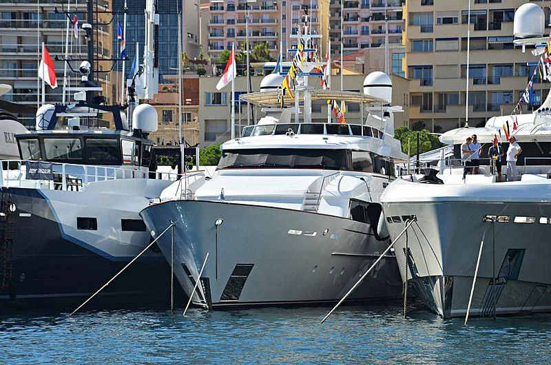 several boats docked at a pier aboard NATALIA V Yacht for Sale