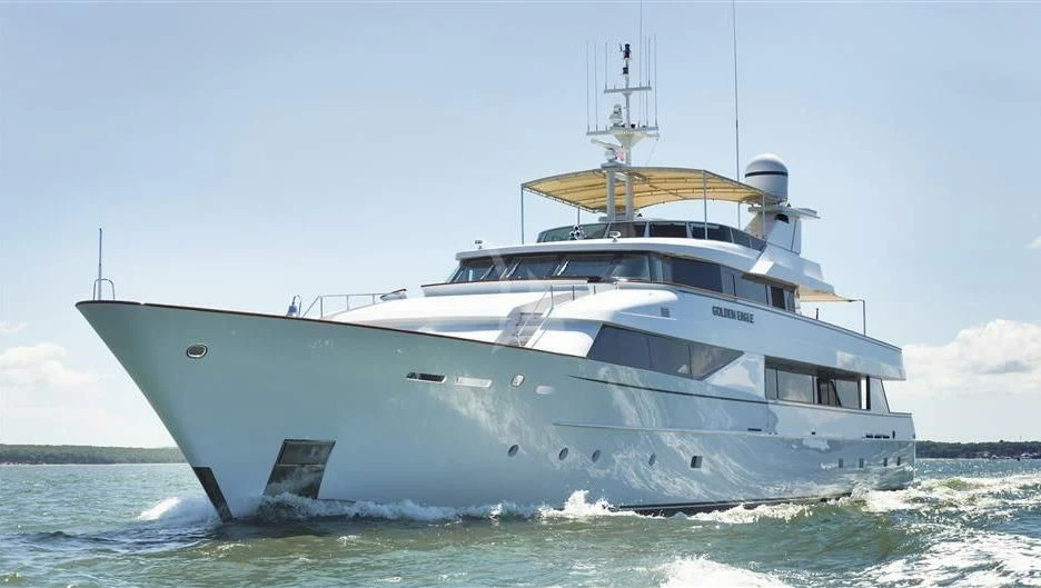 a large white boat in the water aboard NATALIA V Yacht for Sale