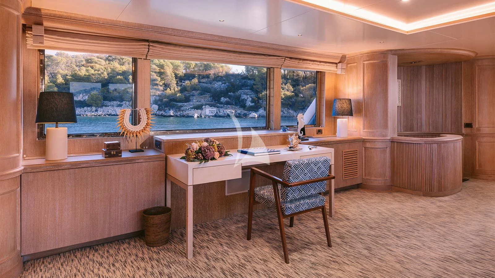 a room with a table and chairs aboard NATALIA V Yacht for Sale