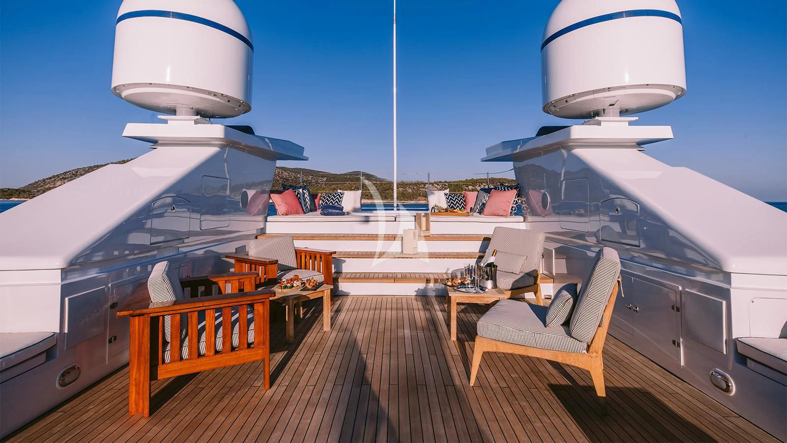 a deck with chairs and a bench aboard NATALIA V Yacht for Sale