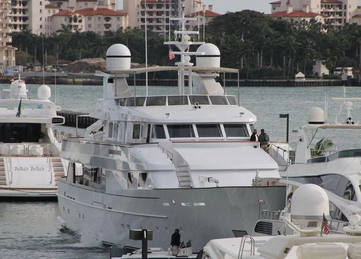 a group of boats are parked in a harbor aboard NATALIA V Yacht for Sale