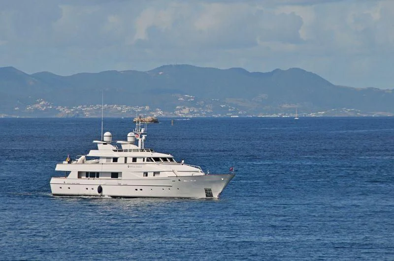 a white boat in the water aboard NATALIA V Yacht for Sale