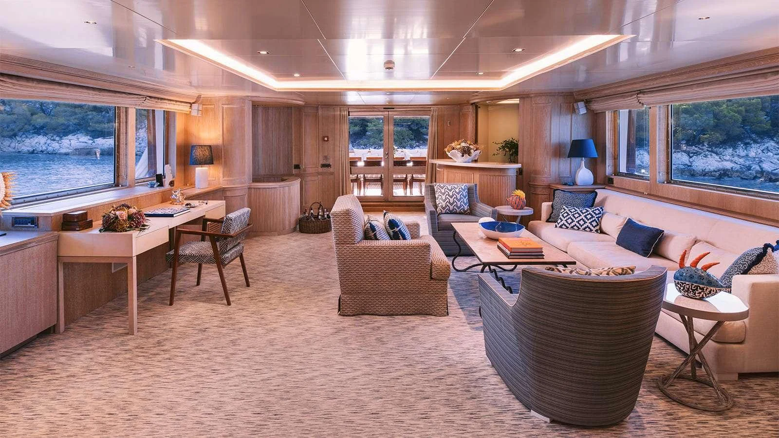 a living room with a large open floor plan aboard NATALIA V Yacht for Sale