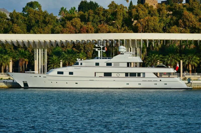 a white boat in the water aboard NATALIA V Yacht for Sale