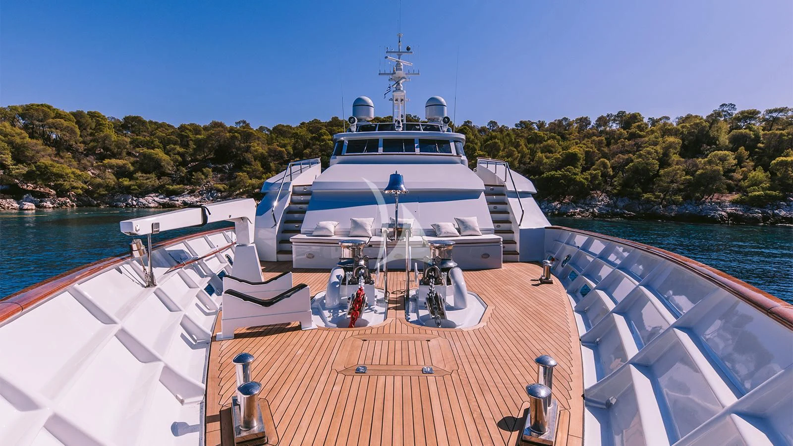 a boat docked at a pier aboard NATALIA V Yacht for Sale