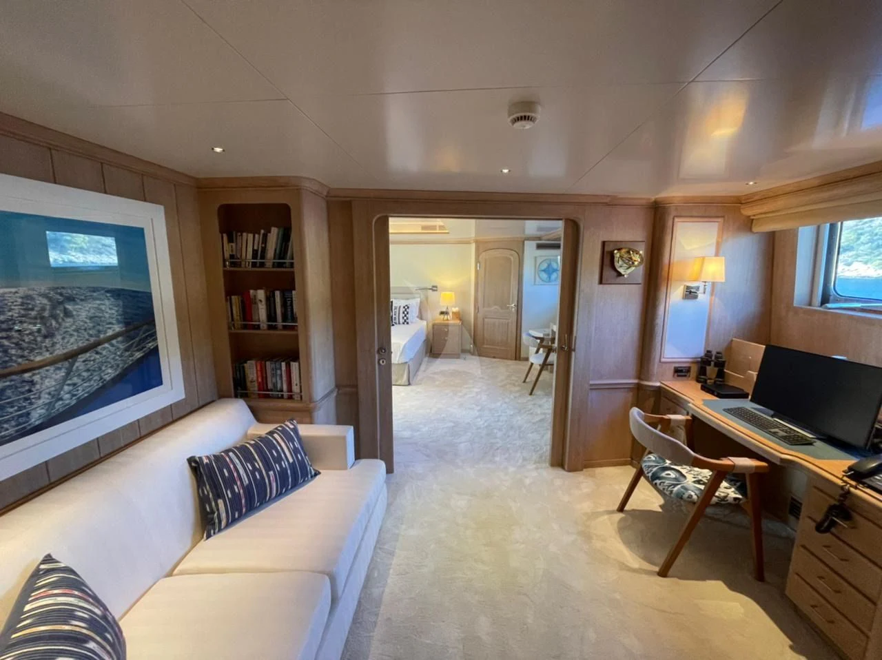 a living room with a large screen aboard NATALIA V Yacht for Sale
