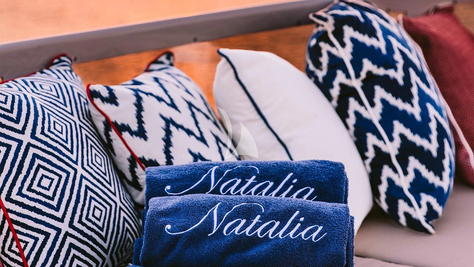 a group of pillows on a bed aboard NATALIA V Yacht for Sale