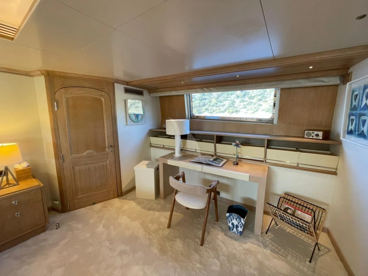 a room with a desk and a chair aboard NATALIA V Yacht for Sale