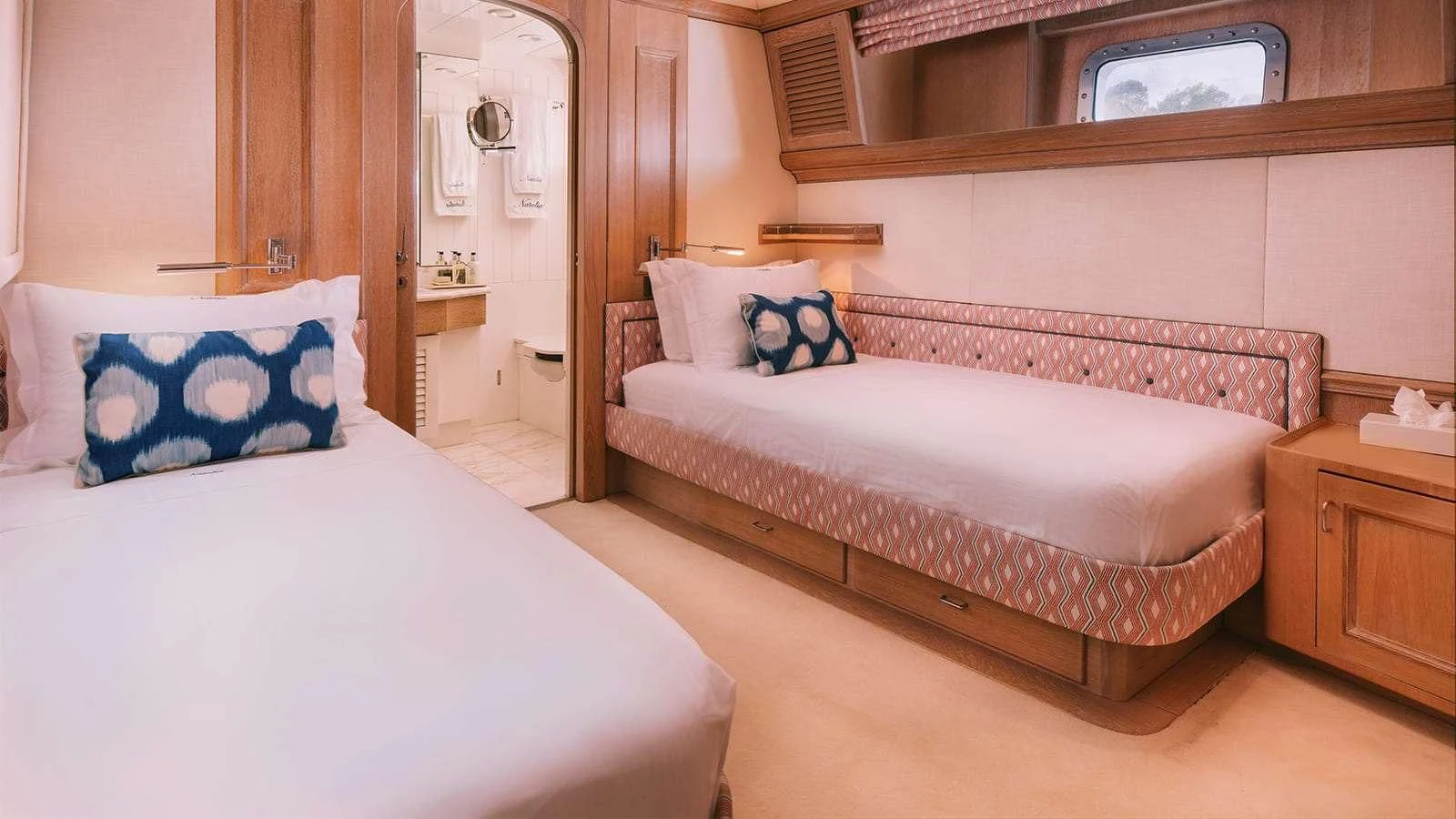 a room with two beds aboard NATALIA V Yacht for Sale