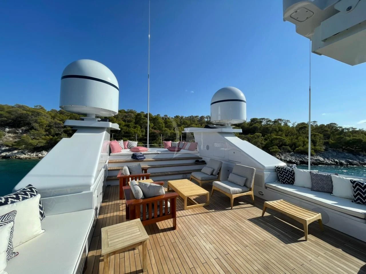 a deck with a deck and a large building with a dome on top aboard NATALIA V Yacht for Sale