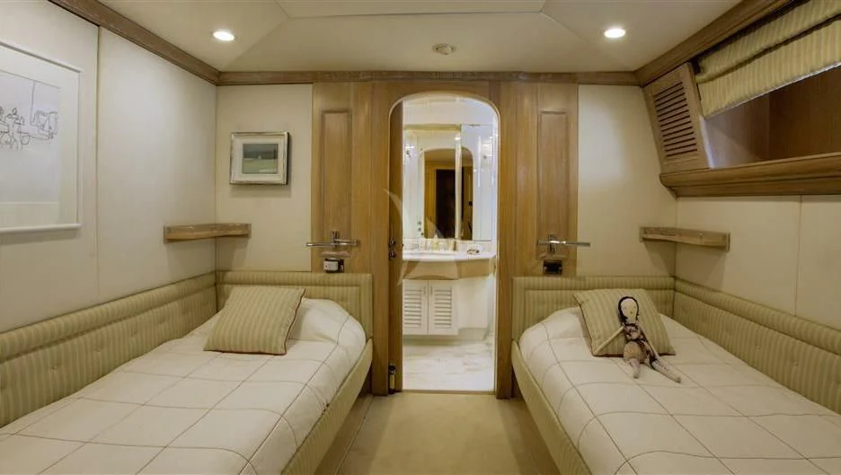 a room with two beds aboard NATALIA V Yacht for Sale