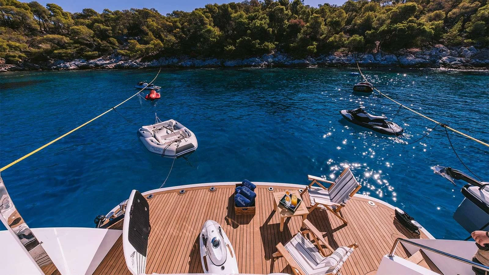 a boat on the water aboard NATALIA V Yacht for Sale