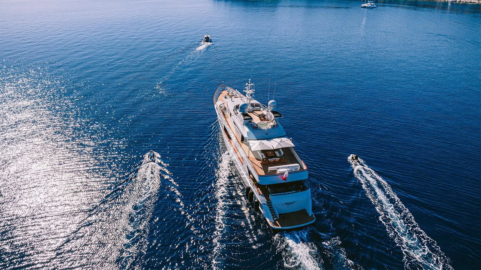a boat sailing on the water aboard NATALIA V Yacht for Sale