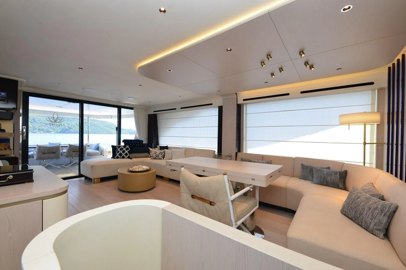 a living room with a large window aboard ANANDA Yacht for Sale