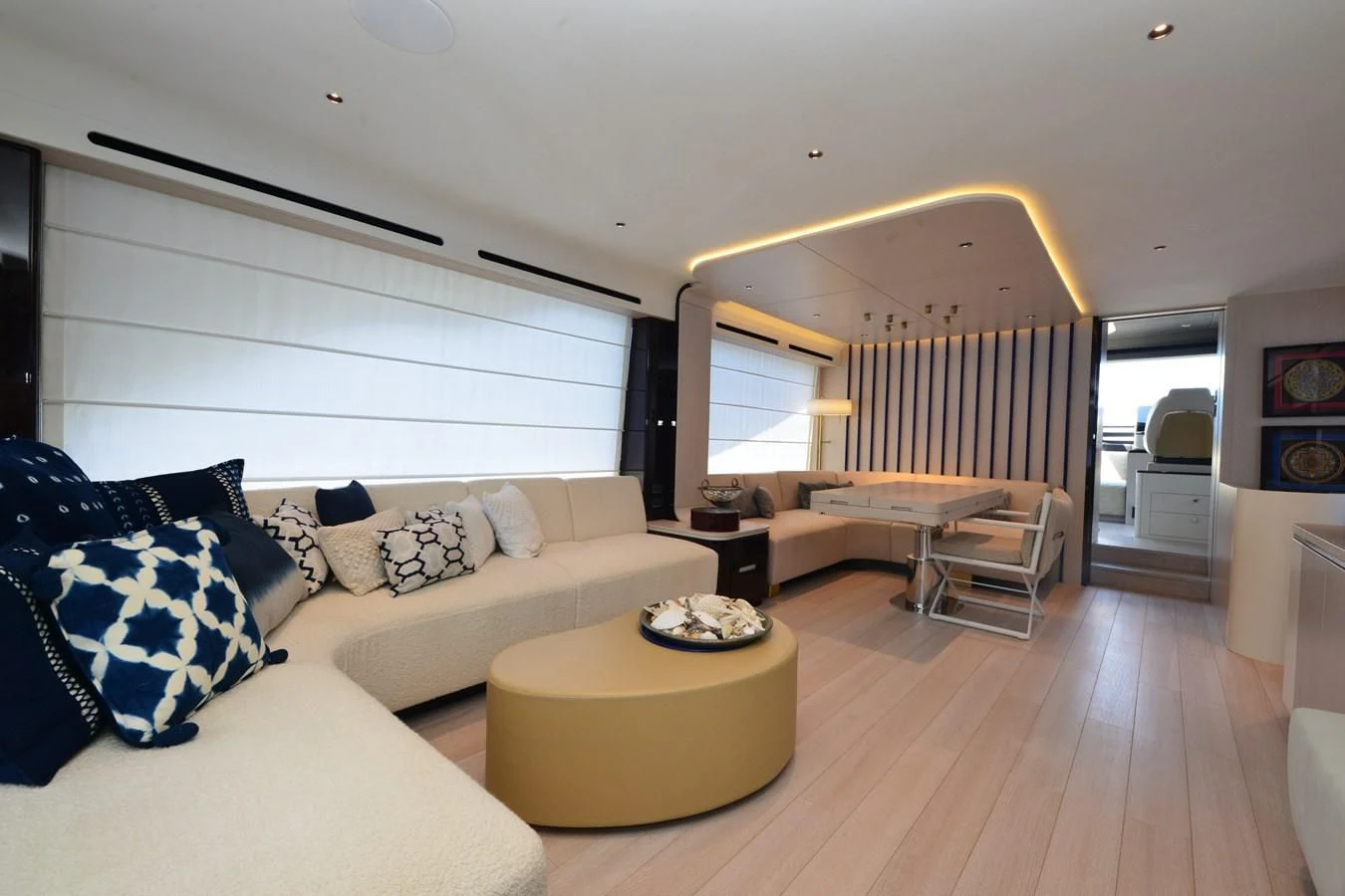 a living room with a couch and a table aboard ANANDA Yacht for Sale