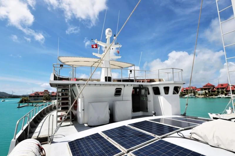 a boat docked at a pier aboard BASILISK Yacht for Sale