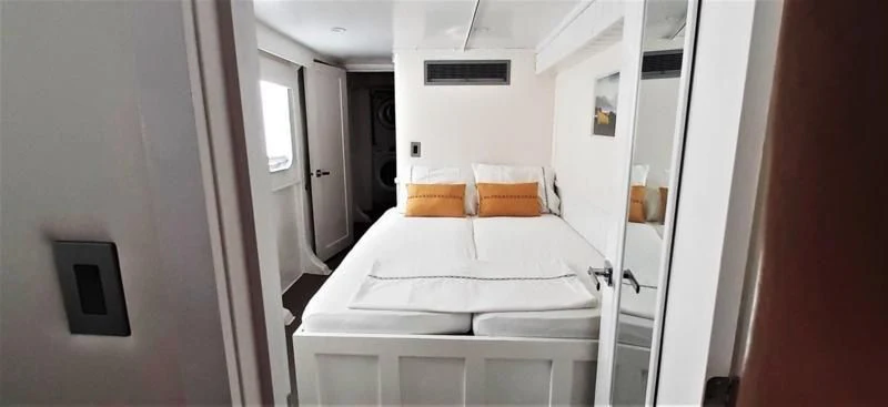 a bed in a room aboard BASILISK Yacht for Sale