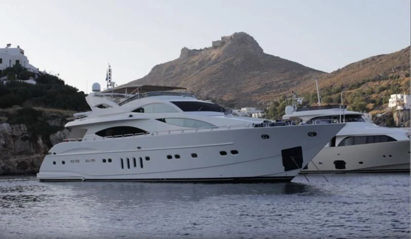 a couple of yachts in the water aboard CORAL Yacht for Sale