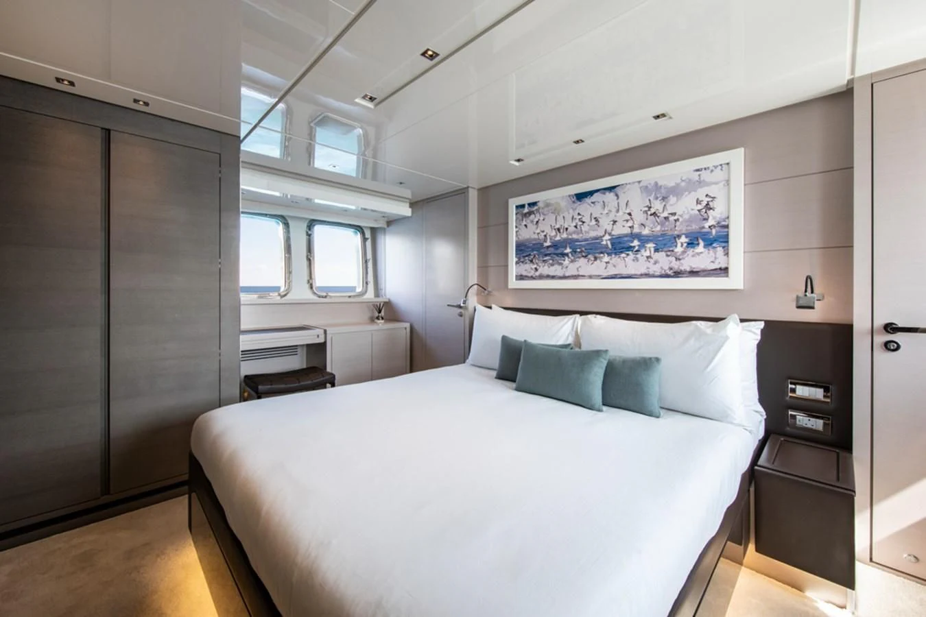 a large bed in a room aboard BALANCE Yacht for Sale