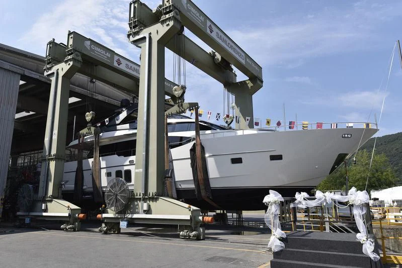 a large white boat with a statue in front of it aboard BALANCE Yacht for Sale