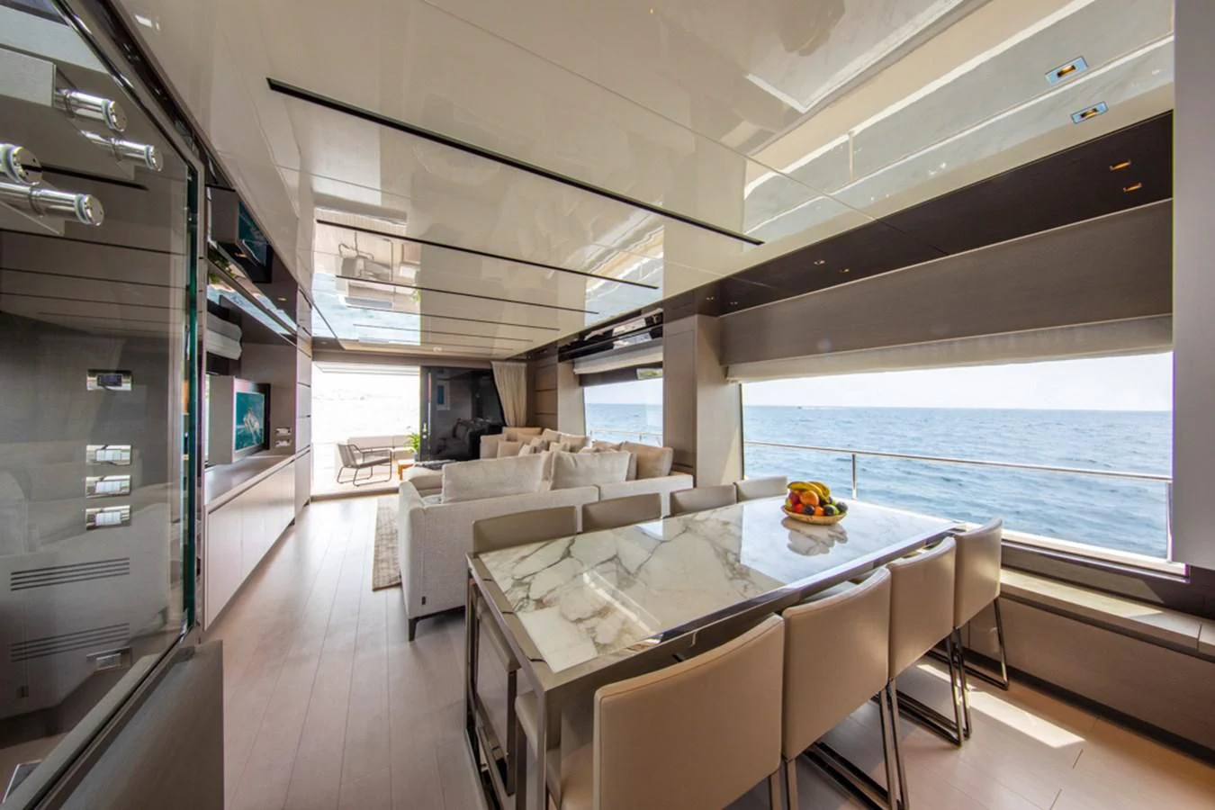 a room with a table and chairs aboard BALANCE Yacht for Sale