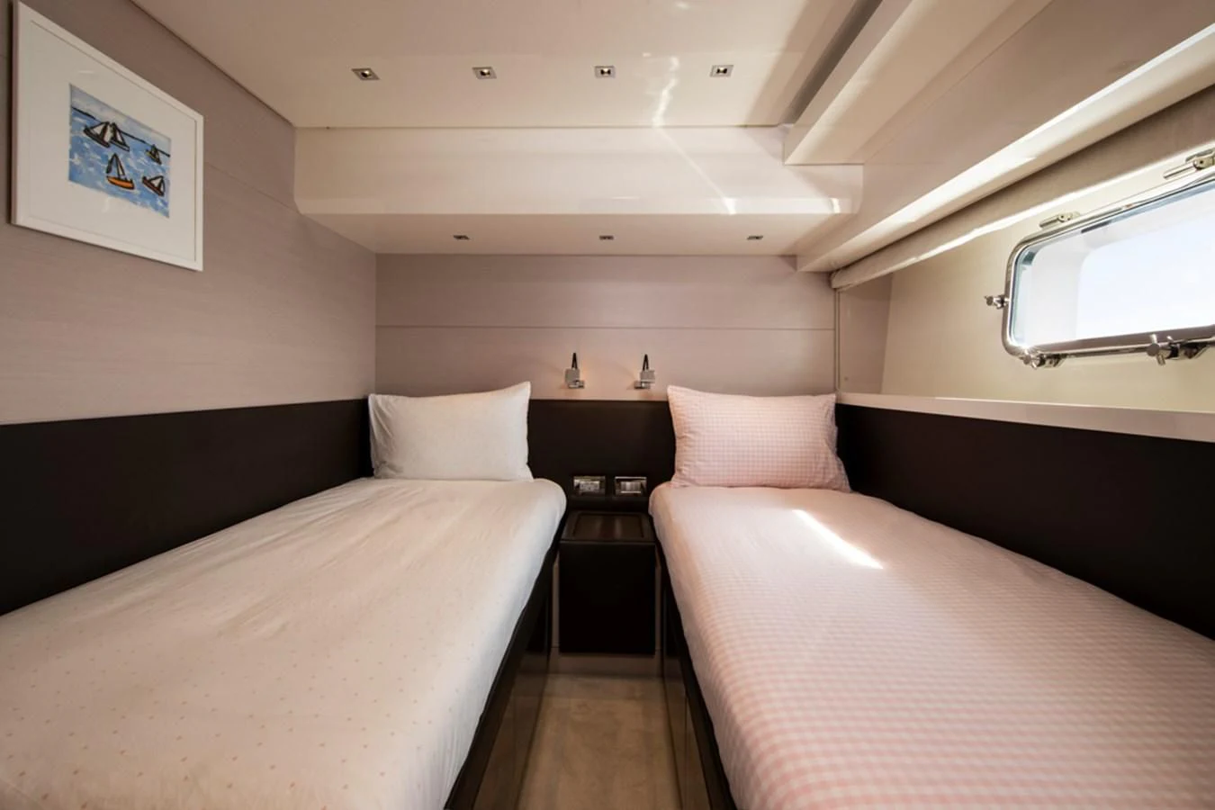 a room with two beds aboard BALANCE Yacht for Sale
