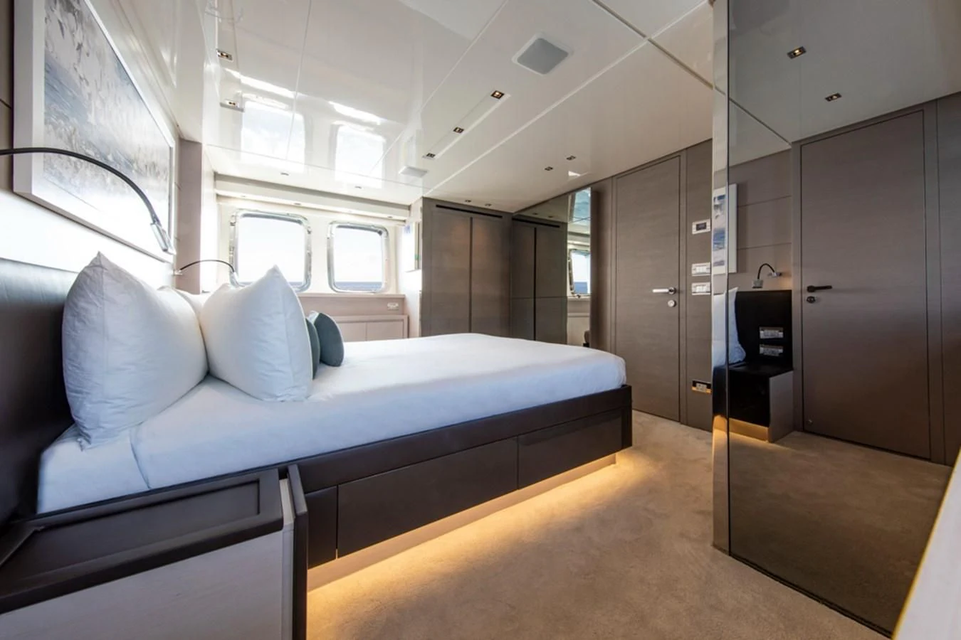 a room with a bed and a desk aboard BALANCE Yacht for Sale