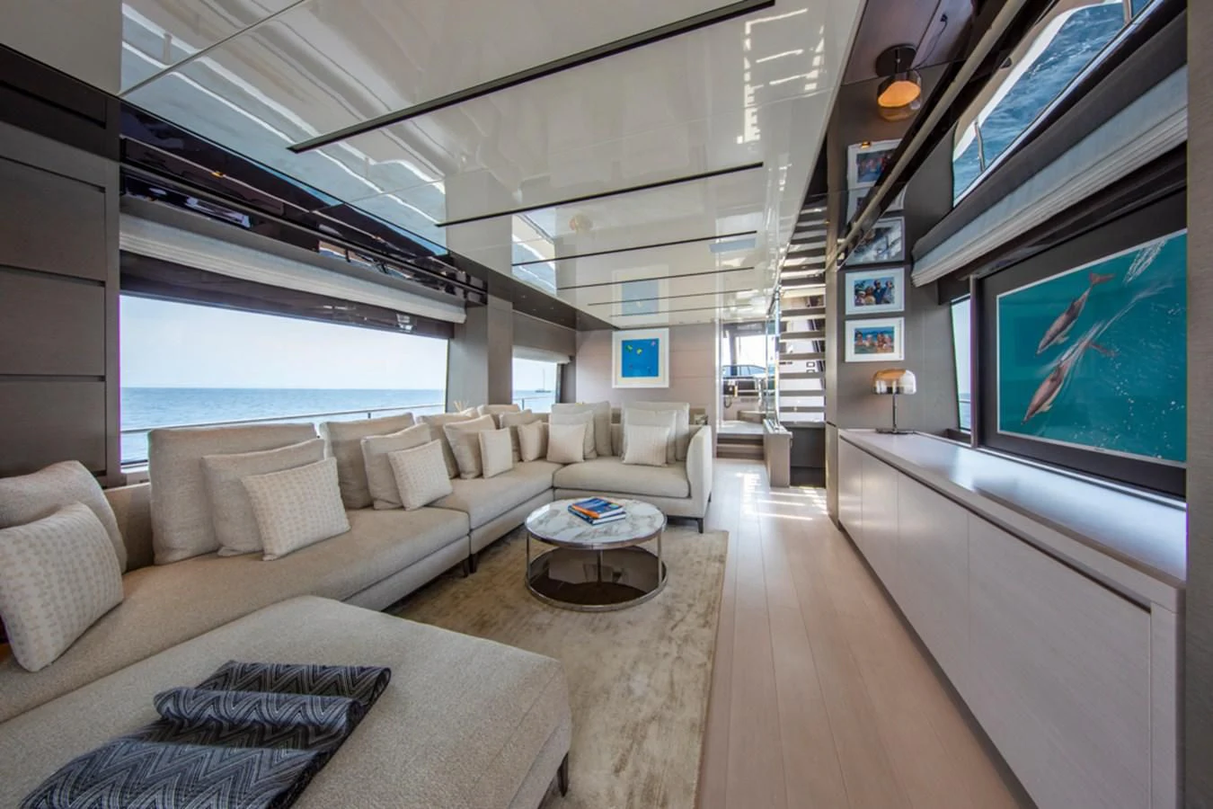 a living room with a large window aboard BALANCE Yacht for Sale