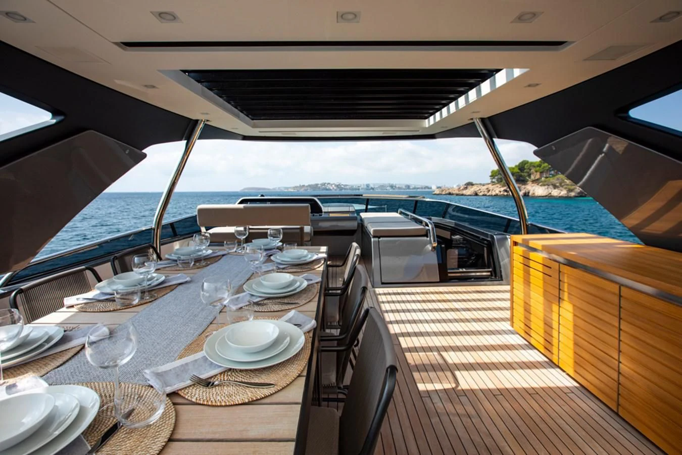 a boat with a table set for a meal aboard BALANCE Yacht for Sale