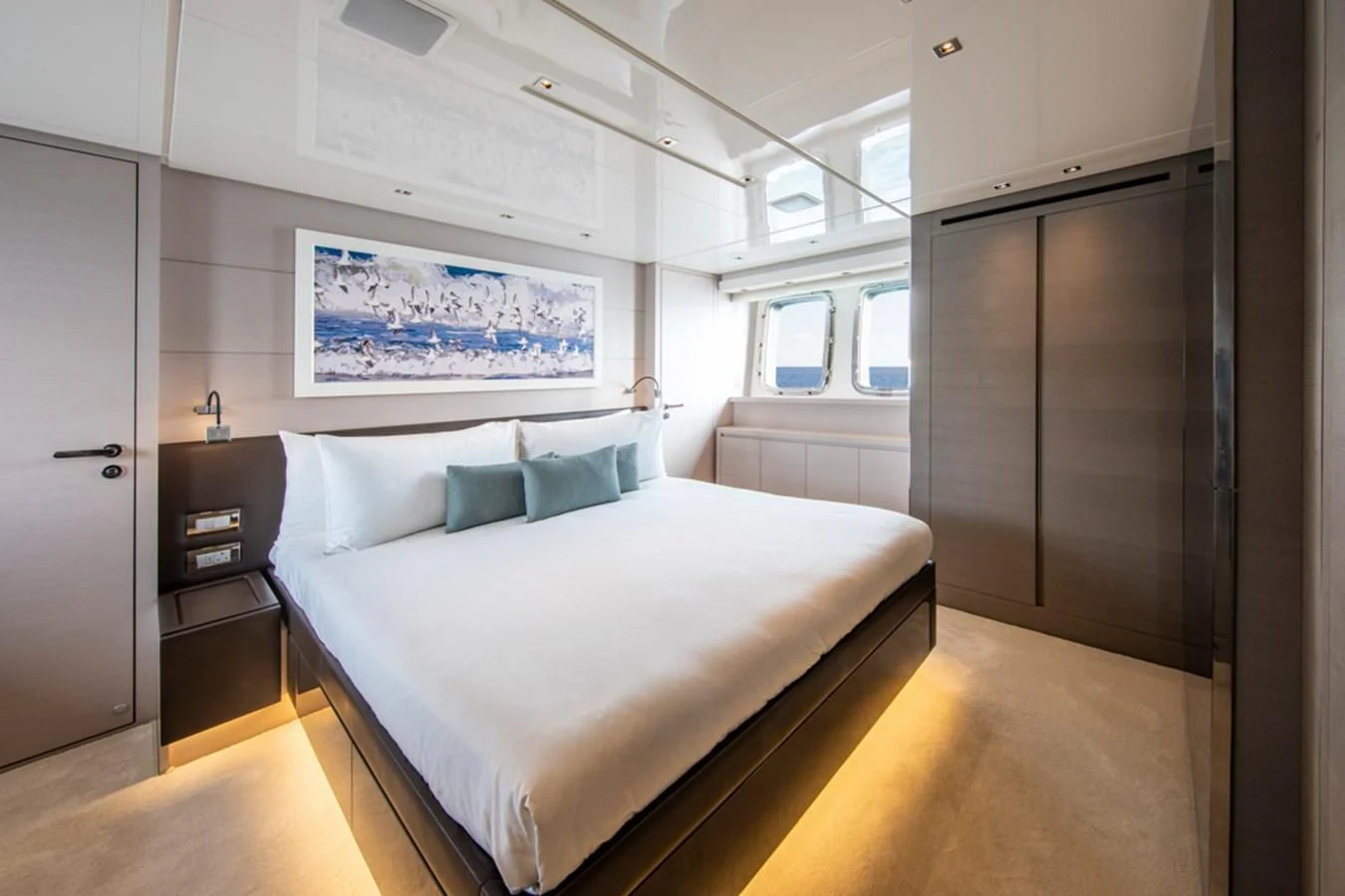 a large bedroom with a bed aboard BALANCE Yacht for Sale