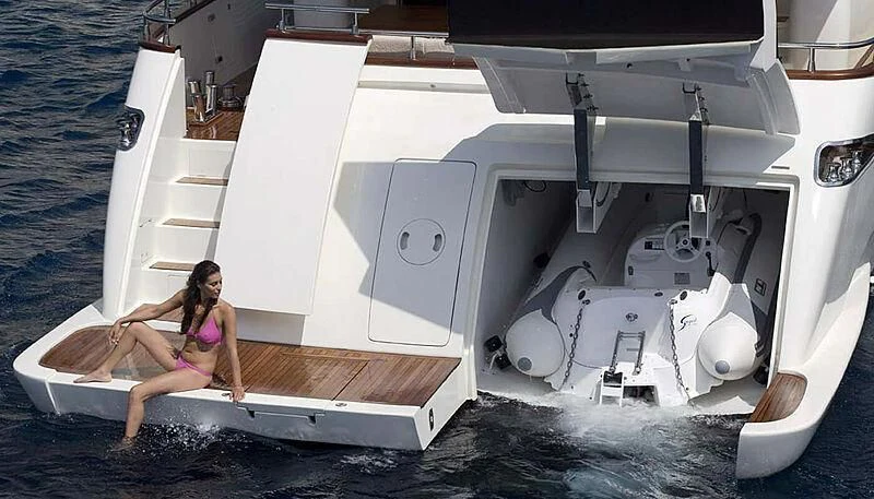 a person sitting on a boat aboard HABANO Yacht for Sale