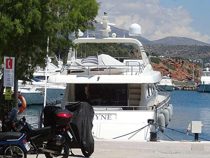 a boat docked at a pier aboard HABANO Yacht for Sale