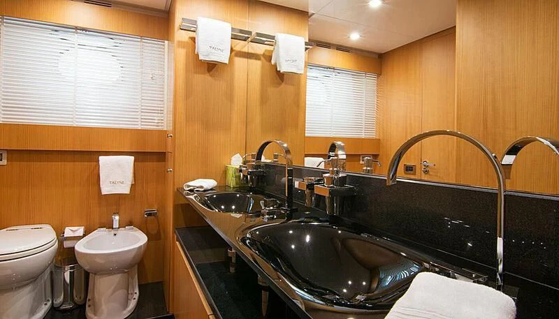 a bathroom with a sink and a toilet aboard HABANO Yacht for Sale