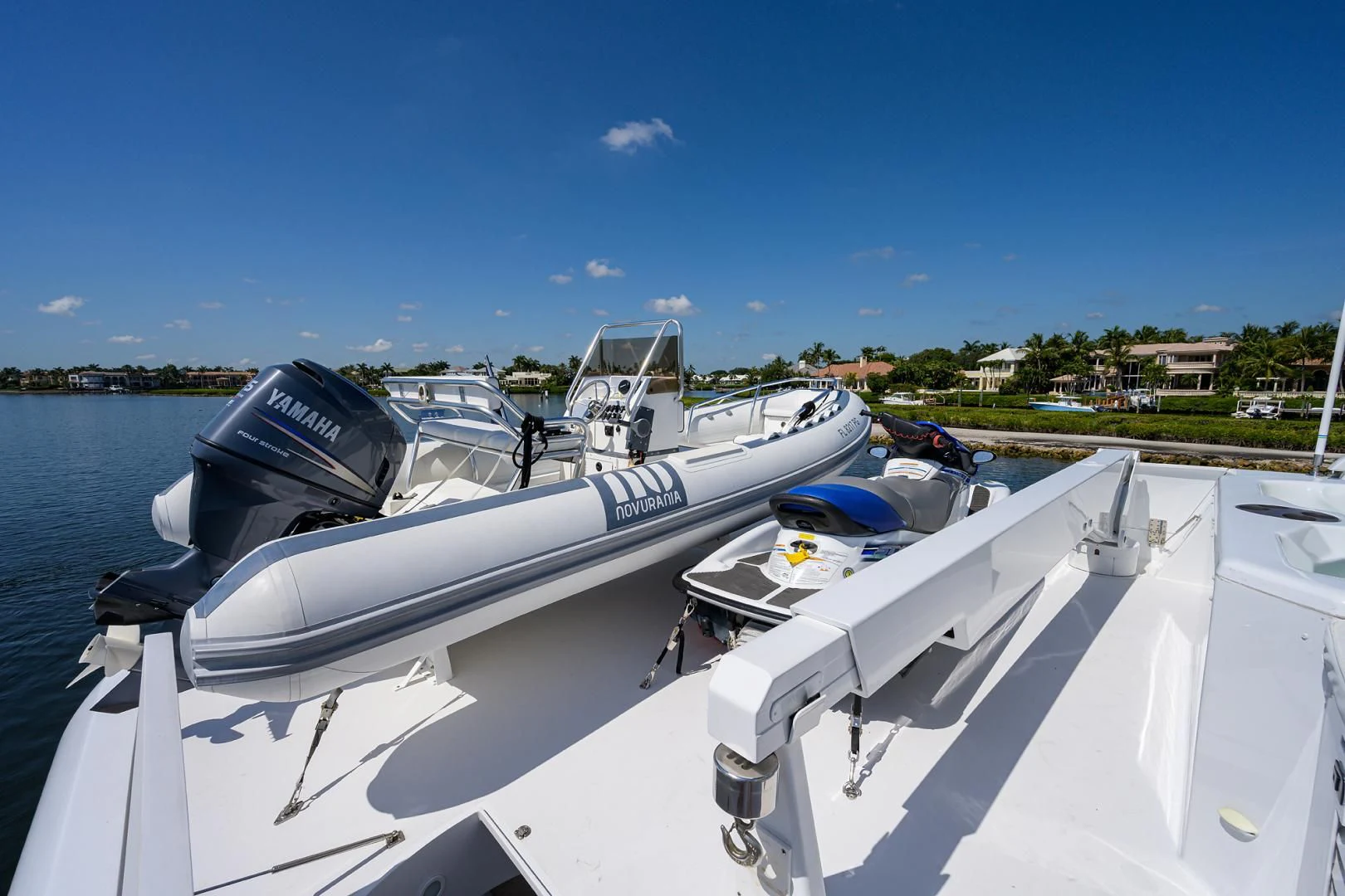 a boat with a motor attached to it aboard MY GIRL Yacht for Sale