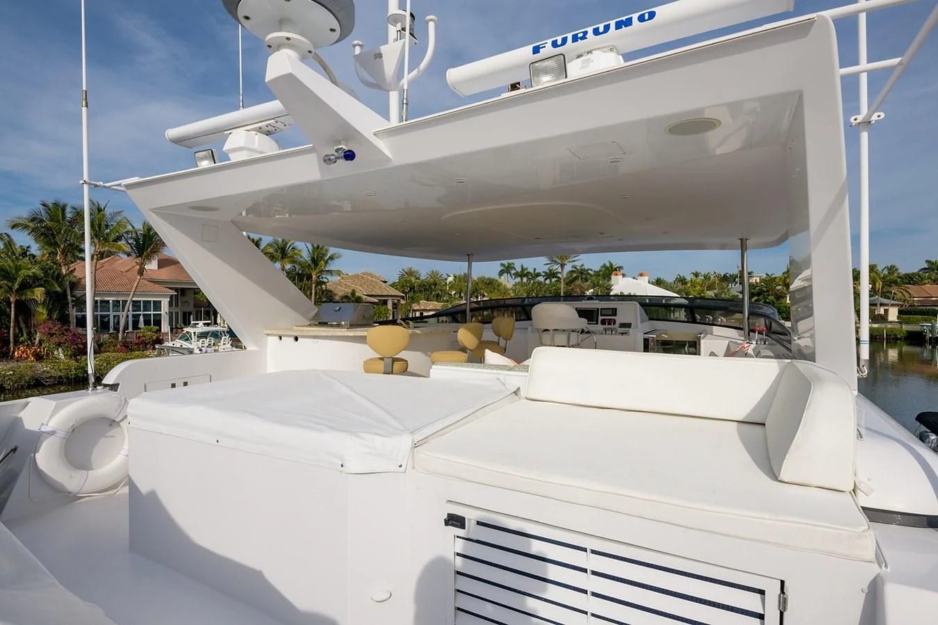 a white boat on a dock aboard MY GIRL Yacht for Sale