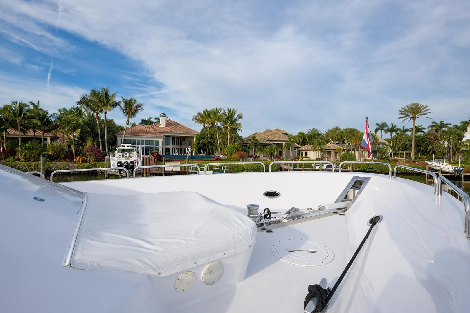 a white boat on a beach aboard MY GIRL Yacht for Sale