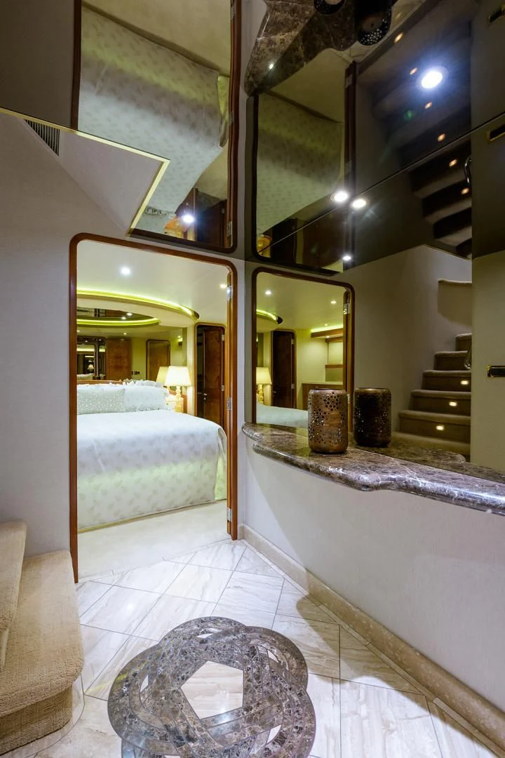 a large bathroom with a large mirror aboard MY GIRL Yacht for Sale