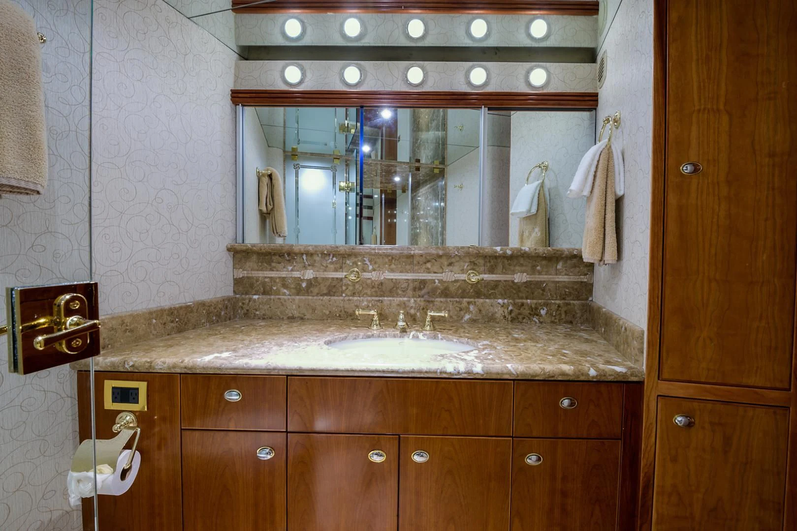 a bathroom with a large mirror aboard MY GIRL Yacht for Sale