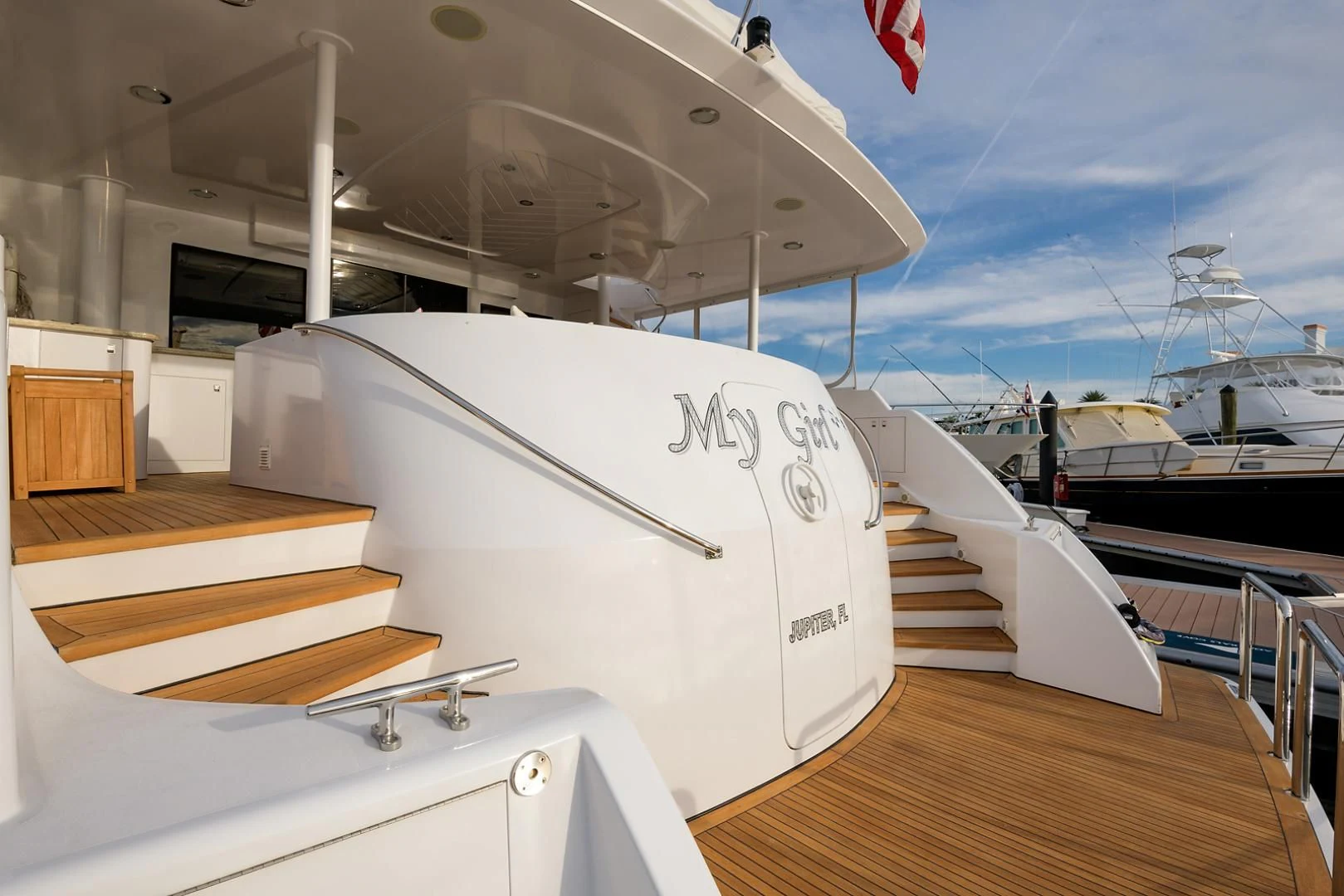 a boat on a deck aboard MY GIRL Yacht for Sale