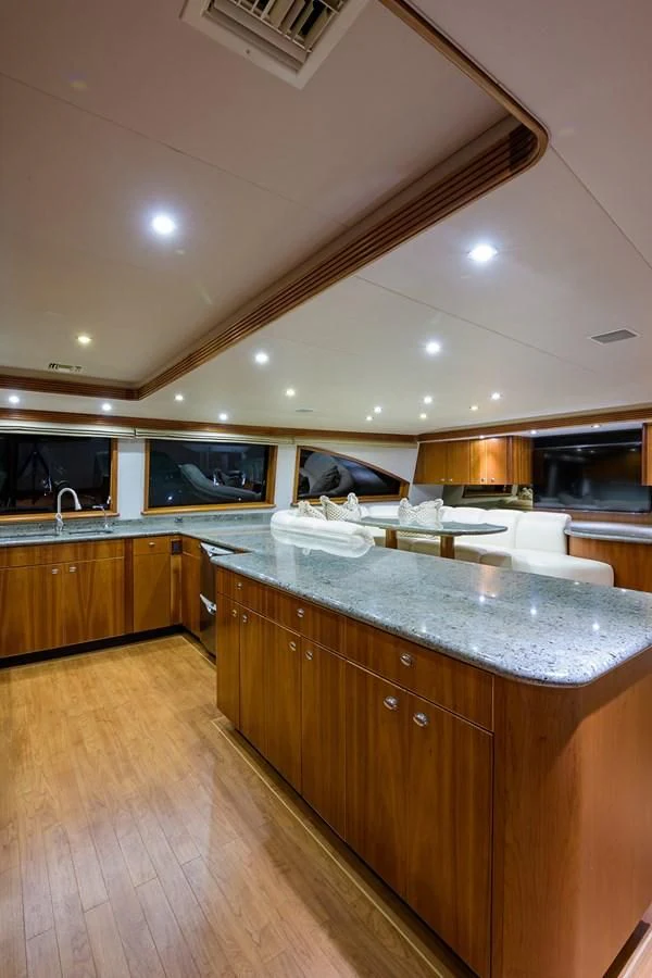 a kitchen with a large island aboard MY GIRL Yacht for Sale
