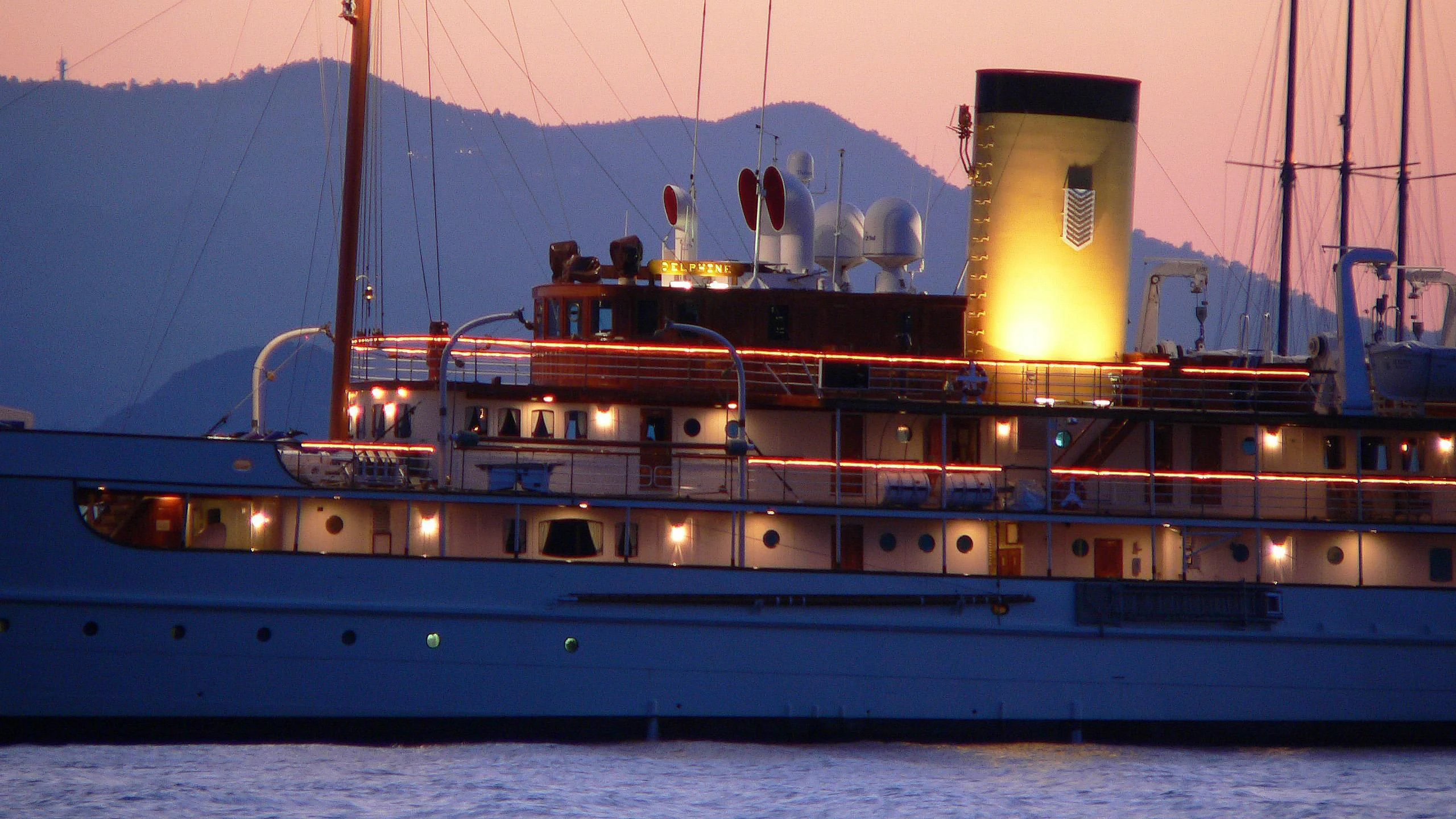 a large ship in the water aboard SS DELPHINE Yacht for Sale