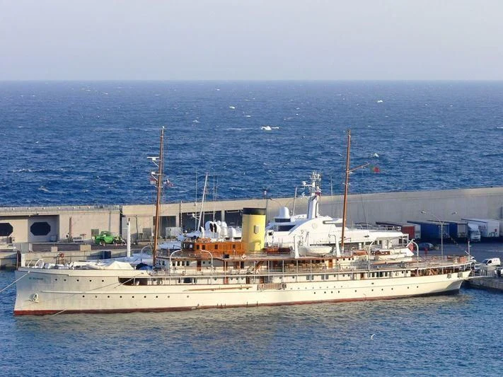 a large white boat in the water aboard SS DELPHINE Yacht for Sale