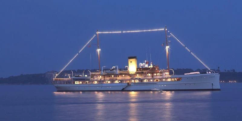 a large ship in the water aboard SS DELPHINE Yacht for Sale