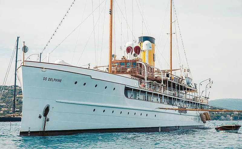 a large white boat in the water aboard SS DELPHINE Yacht for Sale